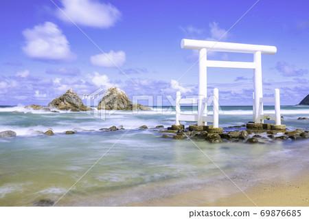 White torii gate and Meotoiwa in Futamigaura taken with slow shutter in Itoshima City, Fukuoka Prefecture 69876685