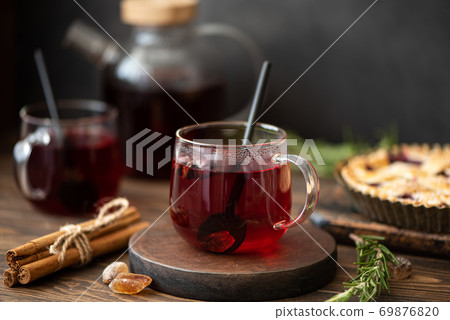 hot hibiscus tea with cinnamon and sugar 69876820