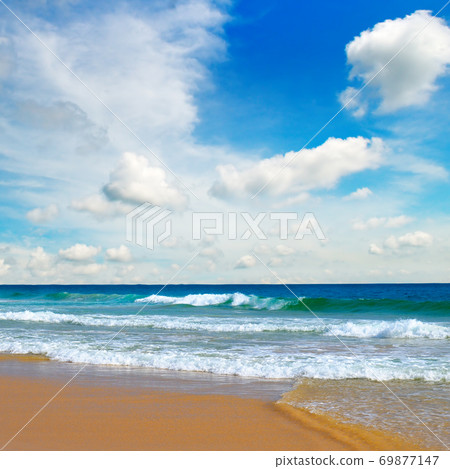 Sea and clouds on blue Sky background. 69877147