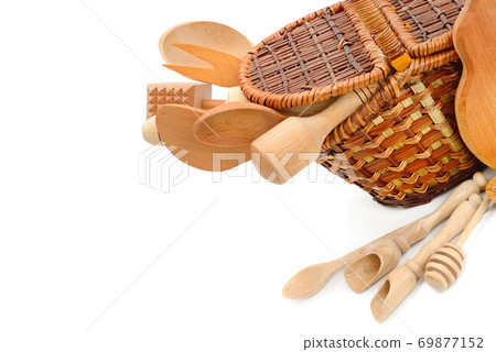 Kitchen wooden spatulas and spoons isolated on a white background. Free space for text. Kitchen wooden spatulas and spoons isolated on a white background. Free space for text. 69877152