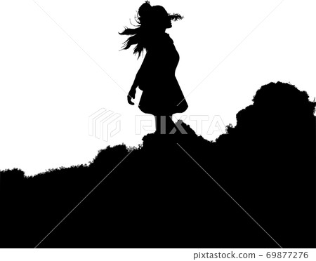 Woman silhouette walking on the mountain outdoors 69877276