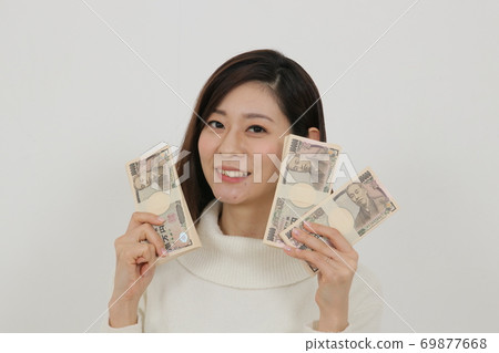 A woman with multiple wads A woman with multiple wads 69877668