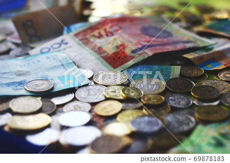 Close up view on kazakh and kyrgyz currencies banknotes and coins 69878183