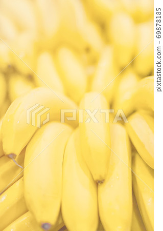 Fresh clear banana sunny yellow background texture vertical light coloured 69878185