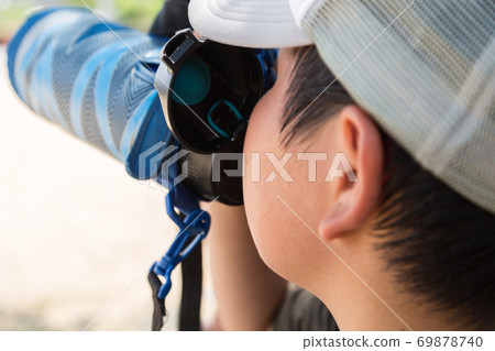 Children drinking tea in a water bottle 69878740