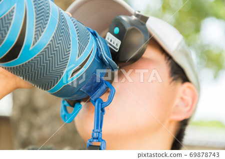 Children drinking tea in a water bottle Children drinking tea in a water bottle 69878743
