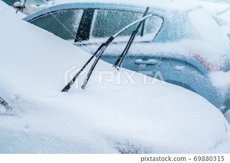 Parked cars with snow 69880315
