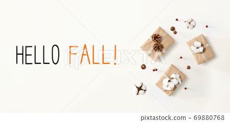 Hello fall message with gift boxes with cottons Hello fall message with gift boxes with cottons 69880768