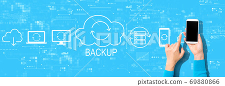 Backup concept with person using a smartphone Backup concept with person using a smartphone 69880866