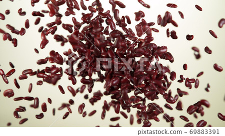 Raw red beans hitting up in the air Raw red beans hitting up in the air 69883391