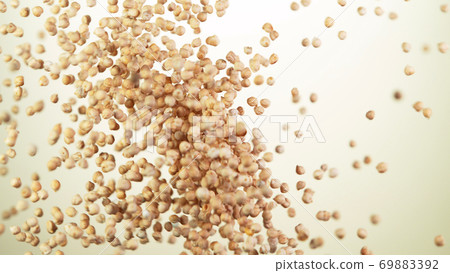 Raw chickpeas pieces hitting up in the air Raw chickpeas pieces hitting up in the air 69883392