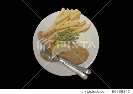 Fish and chips on a dish . Fish and chips on a dish . 69886847