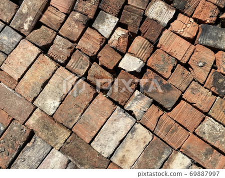 red old bricks laid in one plane 69887997