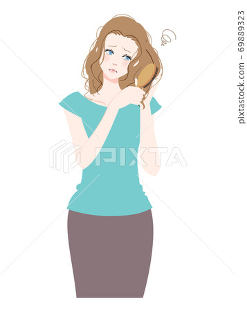 A woman suffering from dry hair 69889323