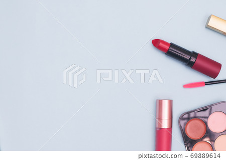 set of professional cosmetics, makeup tools and accessories on blue background, concept of beauty, fashion, shopping, flat lay 69889614