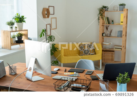 Workplace of contemporary manager or freelancer with computer monitor on table 69891326
