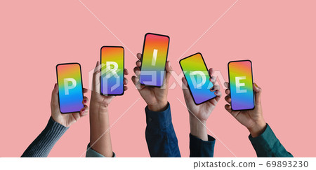 Freedom to Expression for LGTBQ Concept. Group of Diversity People showing Pride Text on Rainbow Color inside a Smartphone. Gender Online Campaign Issue via Social Media in Mobile Phone Freedom to Expression for LGTBQ Concept. Group of Diversity People showing Pride Text on Rainbow Color inside a Smartphone. Gender Online Campaign Issue via Social Media in Mobile Phone 69893230