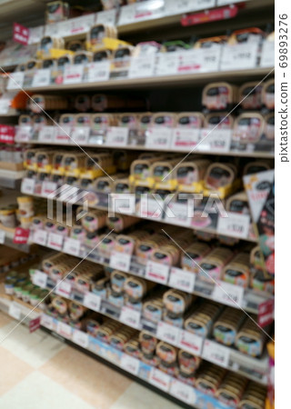 Blurred image of pet shop food display shelves 69893276