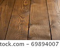 Old wooden plank background with selective focus. 69894007