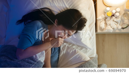asian woman cough in bedroom asian woman cough in bedroom 69894970