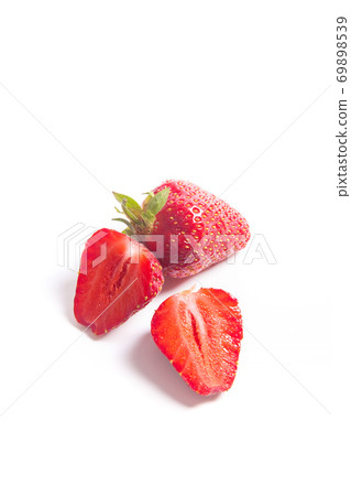 Strawberry fresh ripe sweet berry with sliced half isolated on white. 69898539