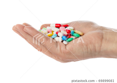Hand with pills Hand with pills 69899081