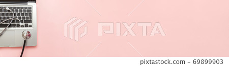 Stethoscope keyboard laptop computer isolated on pink background. Modern medical Information technology and sofware advances concept. Computer and gadget diagnostics and repair Stethoscope keyboard laptop computer isolated on pink background. Modern medical Information technology and sofware advances concept. Computer and gadget diagnostics and repair 69899903