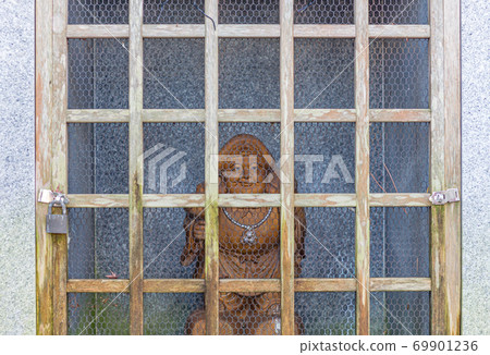 Religious icon in locked cabinet, small local shinto shrine, Kanazawa, Japan. Religious icon in locked cabinet, small local shinto shrine, Kanazawa, Japan. 69901236