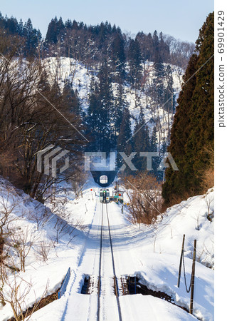 Rikuu West Line train running on the snow Shinjo City, Yamagata Prefecture Rikuu West Line train running on the snow Shinjo City, Yamagata Prefecture 69901429
