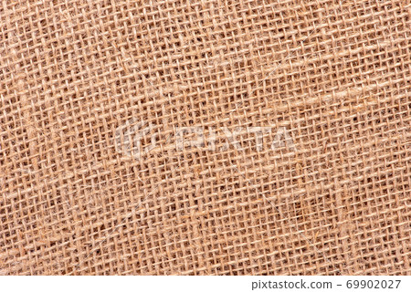 Jute woven fabric as texture background Jute woven fabric as texture background 69902027