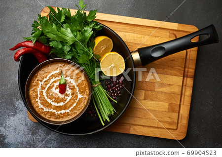 Dal Makhani at dark background Dal Makhani at dark background 69904523