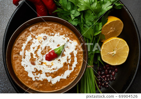 Dal Makhani at dark background Dal Makhani at dark background 69904526