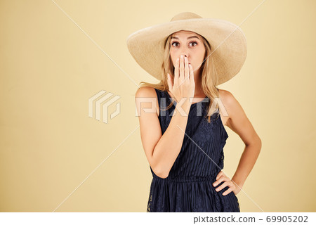 Surprised young woman Surprised young woman 69905202