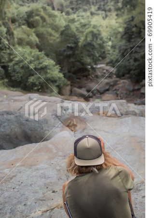 photographer takes pictures of the forest photographer takes pictures of the forest 69905419