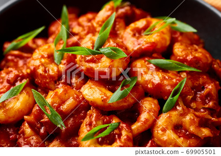 Schezwan Prawns close up. Schezwan Prawns is indo-chinese cuisine dish 69905501