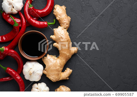 Schezwan Sauce ingredients on black dark slate table top 69905587