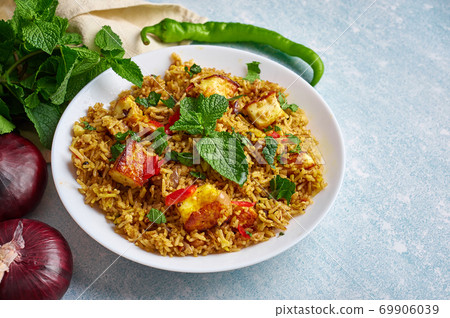 vegetarian paneer biryani at light blue background. 69906039