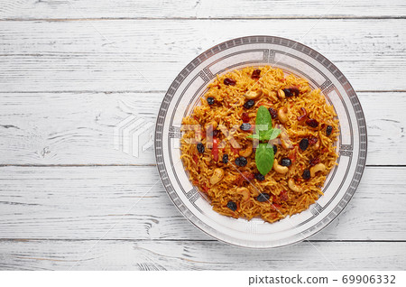 vegetarian kabsa. Ramadan food. Kabsa is traditional saudi arabian cuisine dish. 69906332