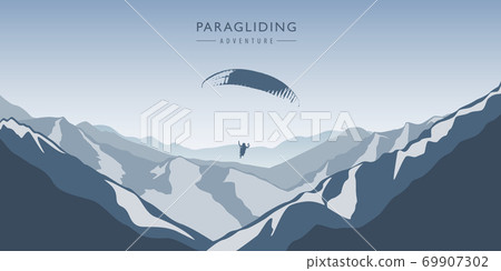 paragliding adventure in blue snowy mountains winter landscape 69907302
