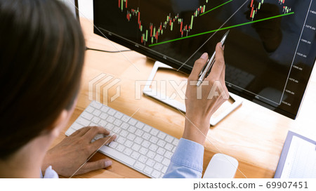stock exchange trader working with graphs,diagrams on monitor in modern trading office stock exchange trader working with graphs,diagrams on monitor in modern trading office 69907451