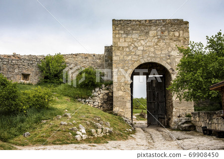 Tower in the Eastern Defence Wall of the ancient city-fortress Chufut-Kale in the Crimean Peninsula Tower in the Eastern Defence Wall of the ancient city-fortress Chufut-Kale in the Crimean Peninsula 69908450