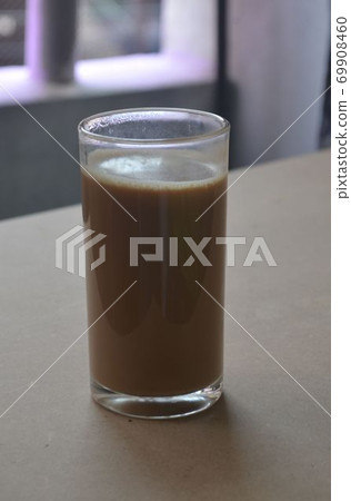 Coffee in a mug. Coffee in a mug. 69908460