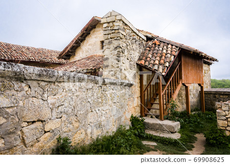 Medieval house in the ancient city-fortress Chufut-Kale in Crimea, Russia 69908625