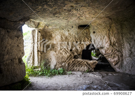 Interior of the house built in cave in the ancient city-fortress Chufut-Kale in Crimea, Russia 69908627