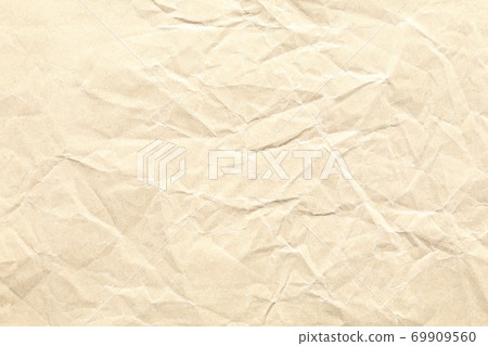 Crumpled brown paper background texture Crumpled brown paper background texture 69909560