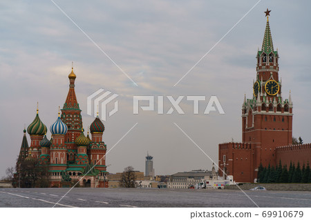 Photography of the domes of the Saint Basil's Cathedral / Cathedral of Vasily the Blessed, Kremlin Spasskaya Tower. Moscow Red Square. Coronavirus pandemic time. 69910679