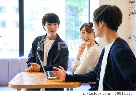 Business person surrounding a personal computer Business person surrounding a personal computer 69911153