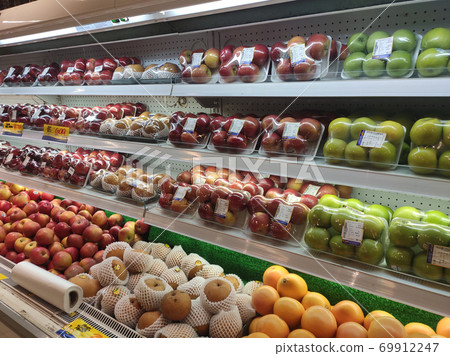 SEREMBAN, MALAYSIA -SEPTEMBER 8, 2020: Fruits are sold at shops. Sort by type to make it easier for customers to choose. Labelled by price. SEREMBAN, MALAYSIA -SEPTEMBER 8, 2020: Fruits are sold at shops. Sort by type to make it easier for customers to choose. Labelled by price. 69912247