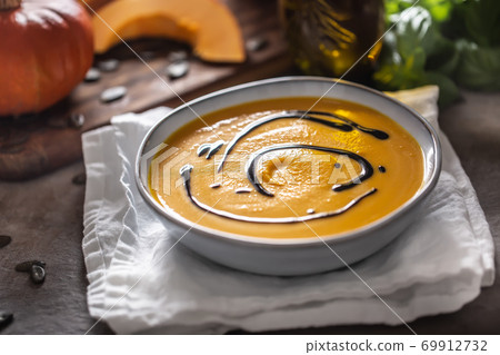 Homemade pumpkin soup in bowles with. Autumn hokkaido soup with balsamic vinegar Homemade pumpkin soup in bowles with. Autumn hokkaido soup with balsamic vinegar 69912732