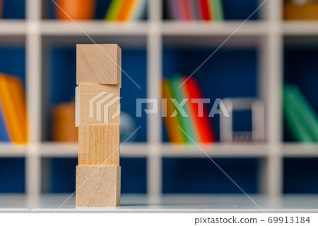 Blank wooden cubes with copy space for your design on office working table Blank wooden cubes with copy space for your design on office working table 69913184
